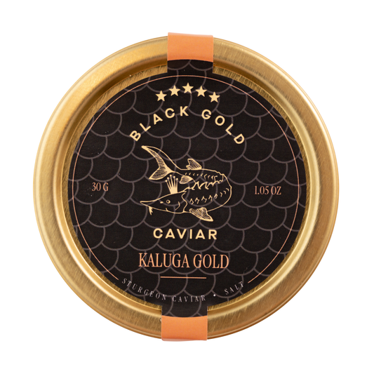 Gold lid of Kaluga Gold caviar with black label and fish illustration